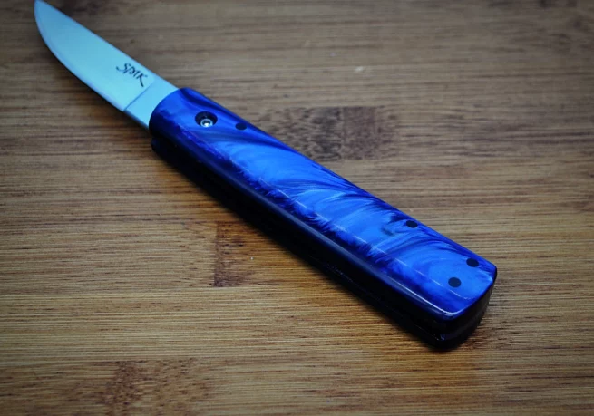 Blue kirinite friction folder handle